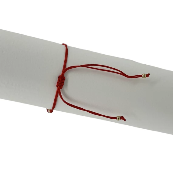 Karkötő piros gyöngyös díszes fém kereszttel